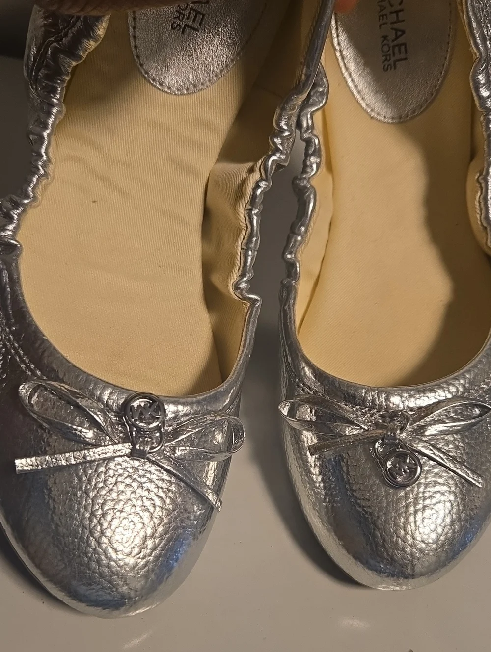 Michael Kors Metallic Silver Bow Ballet Flats